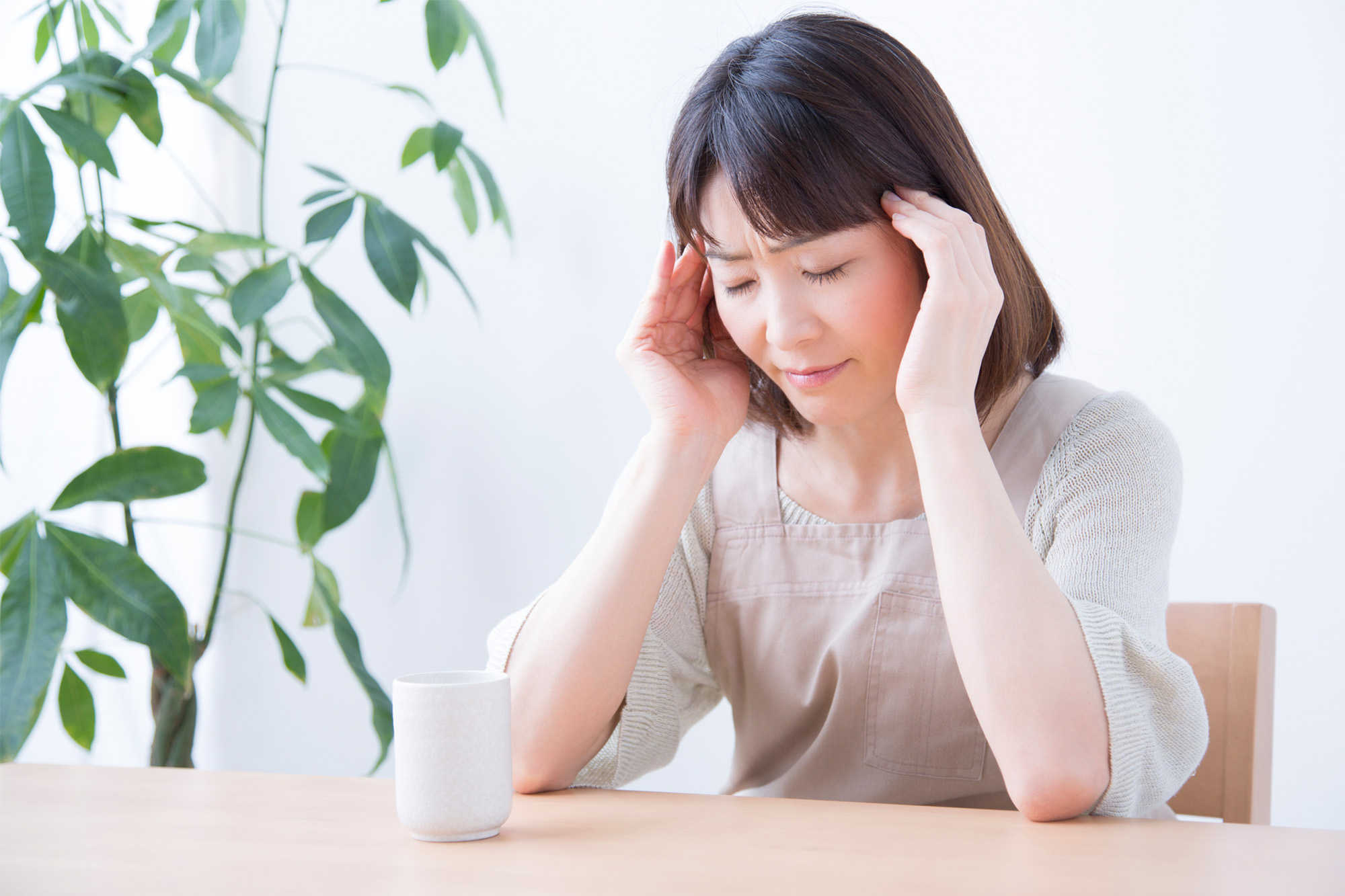 更年期障害の症状に悩む女性